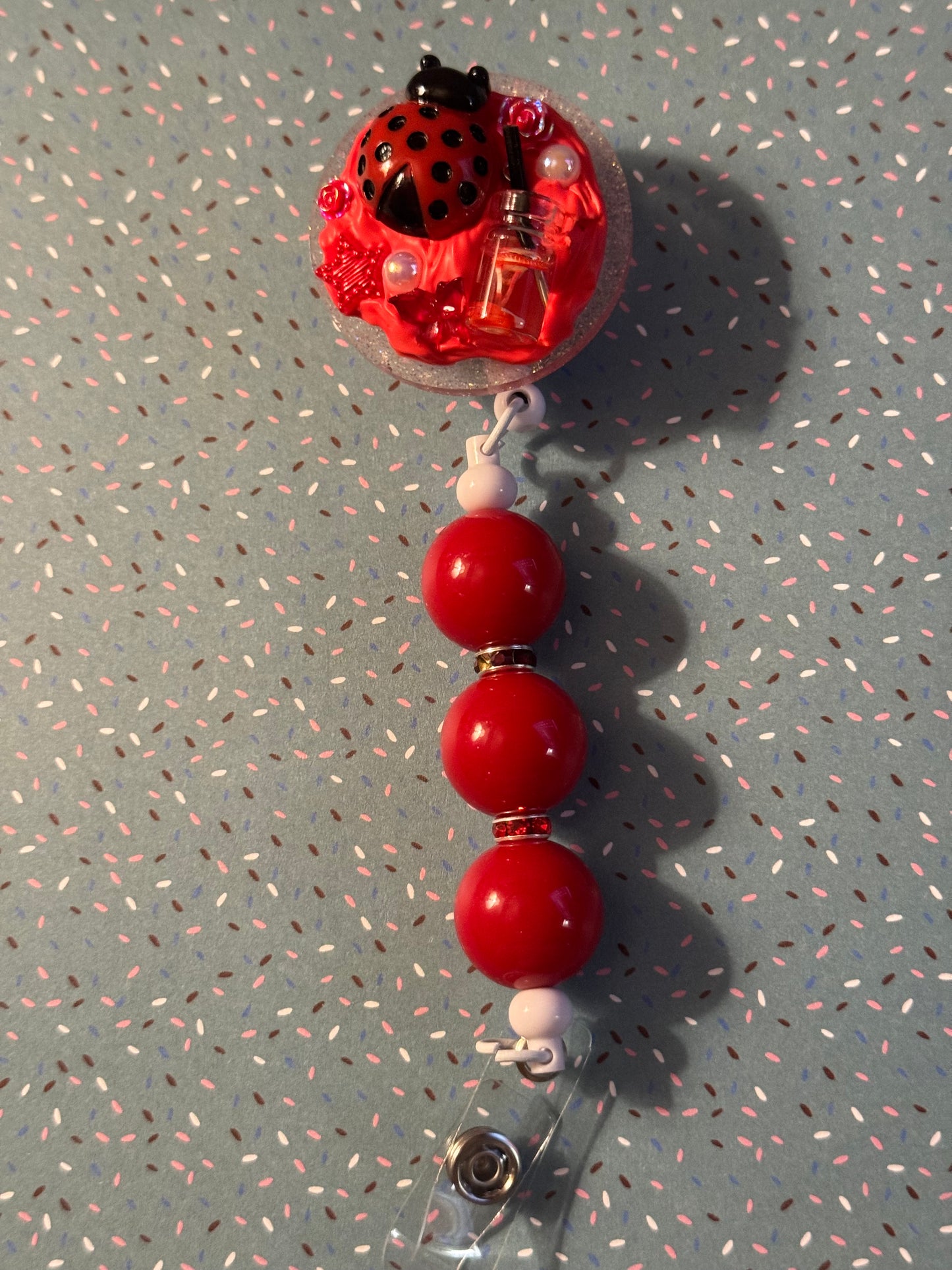 Ladybug badge Reel
