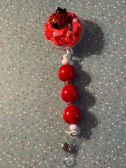 Ladybug badge Reel